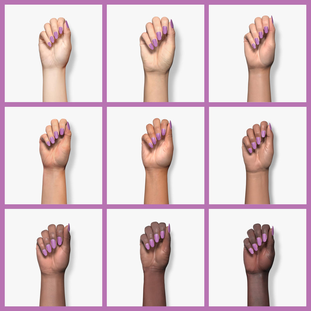 Orly Kaleidoscope Eyes on polished nails in lifestyle setting, showcasing durable shine