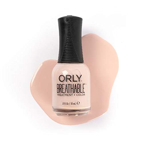 Orly Sheer Luck applied on manicured hands in lifestyle setting demonstrating natural, healthy-looking nails