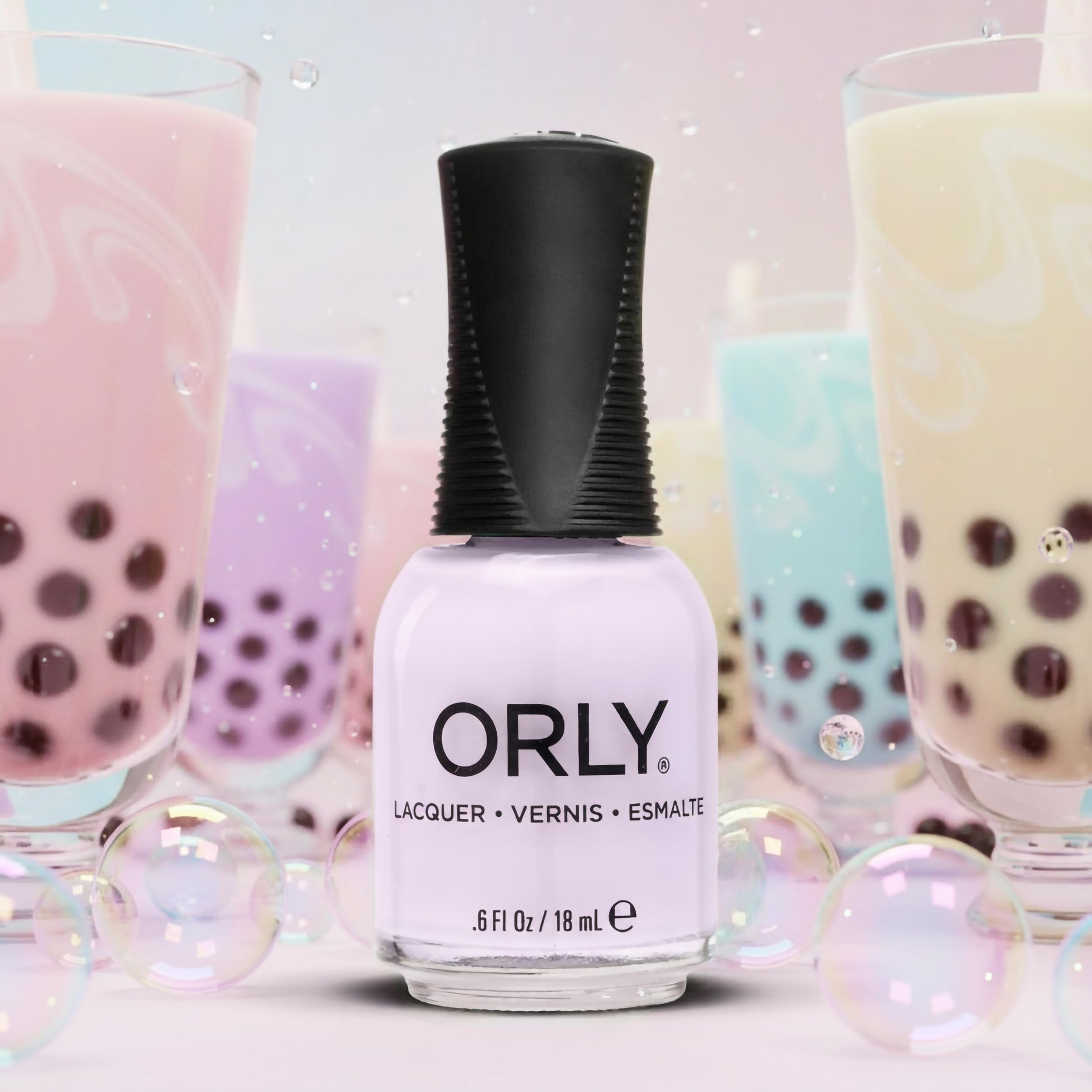 Orly Ube Cloud lifestyle flatlay with bottle and accessories suggesting effortless at-home manicure