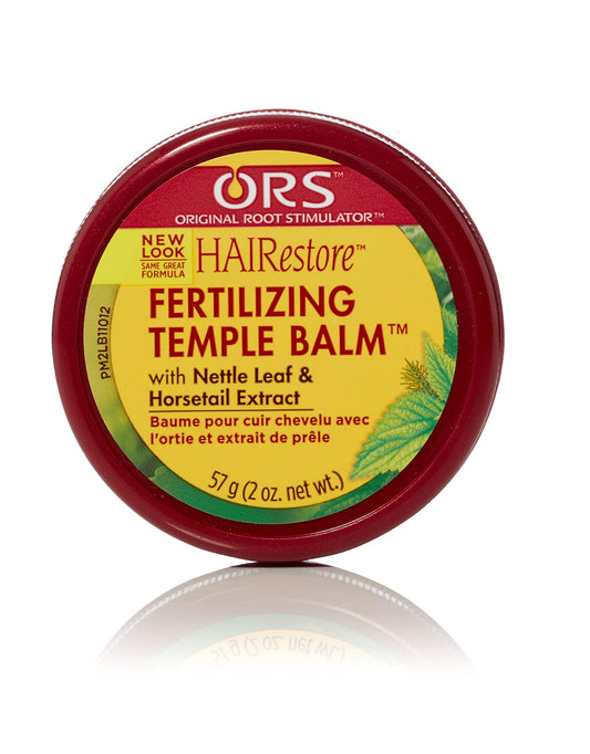 ORS HAIRestore close-up of balm on fingertip demonstrating precise temple application benefit