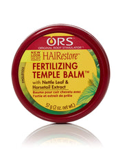 ORS HAIRestore close-up of balm on fingertip demonstrating precise temple application benefit