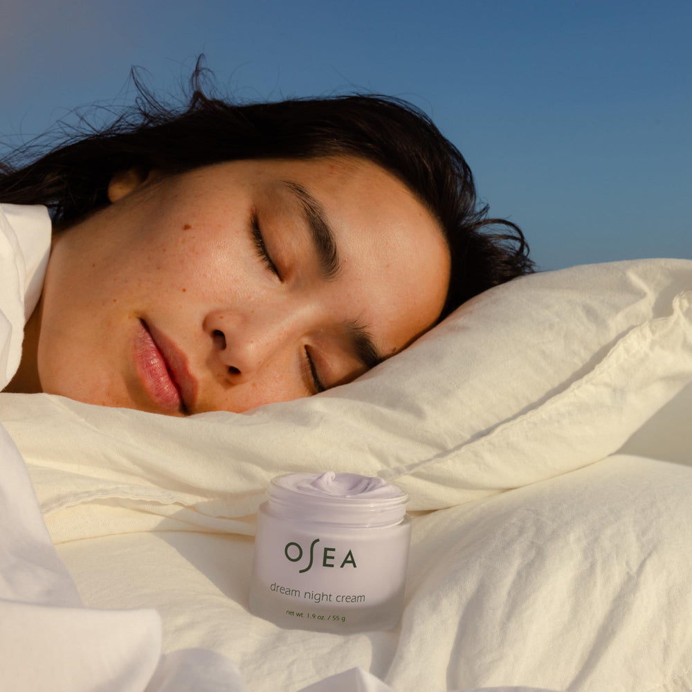 OSEA cream on hand demonstrating smooth application and quick absorption