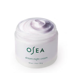 OSEA jar on bedside table evoking calming nighttime skincare ritual