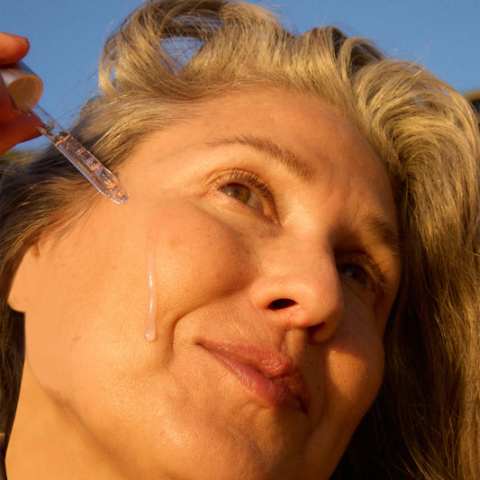 OSEA dropper dispensing serum highlighting precision and easy application