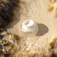 OSEA product on bathroom vanity in lifestyle setting suggesting daily routine benefit