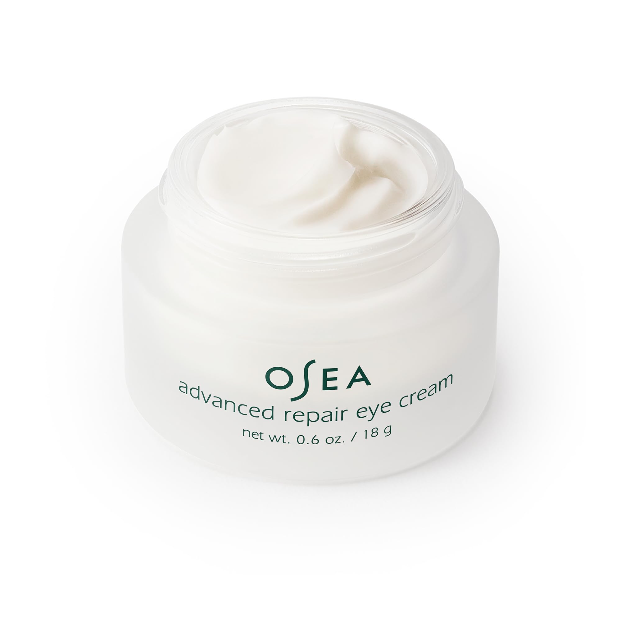 OSEA eye cream beside a common object to show compact 0.6 oz size