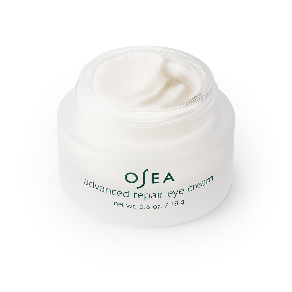 OSEA eye cream beside a common object to show compact 0.6 oz size