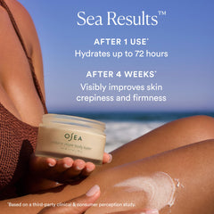 OSEA scoop of body butter on fingertip demonstrating easy application and absorption