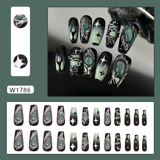 OSTTMA close-up of black to green gradient and silver accents, shows detailed finish