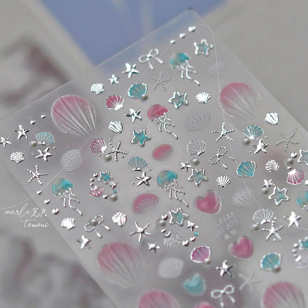 OSTTMA stickers held in hand to show actual 3x4 inch sheet scale