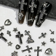 OTKARXUS charm on a natural nail showing discreet gothic accent and wearable style