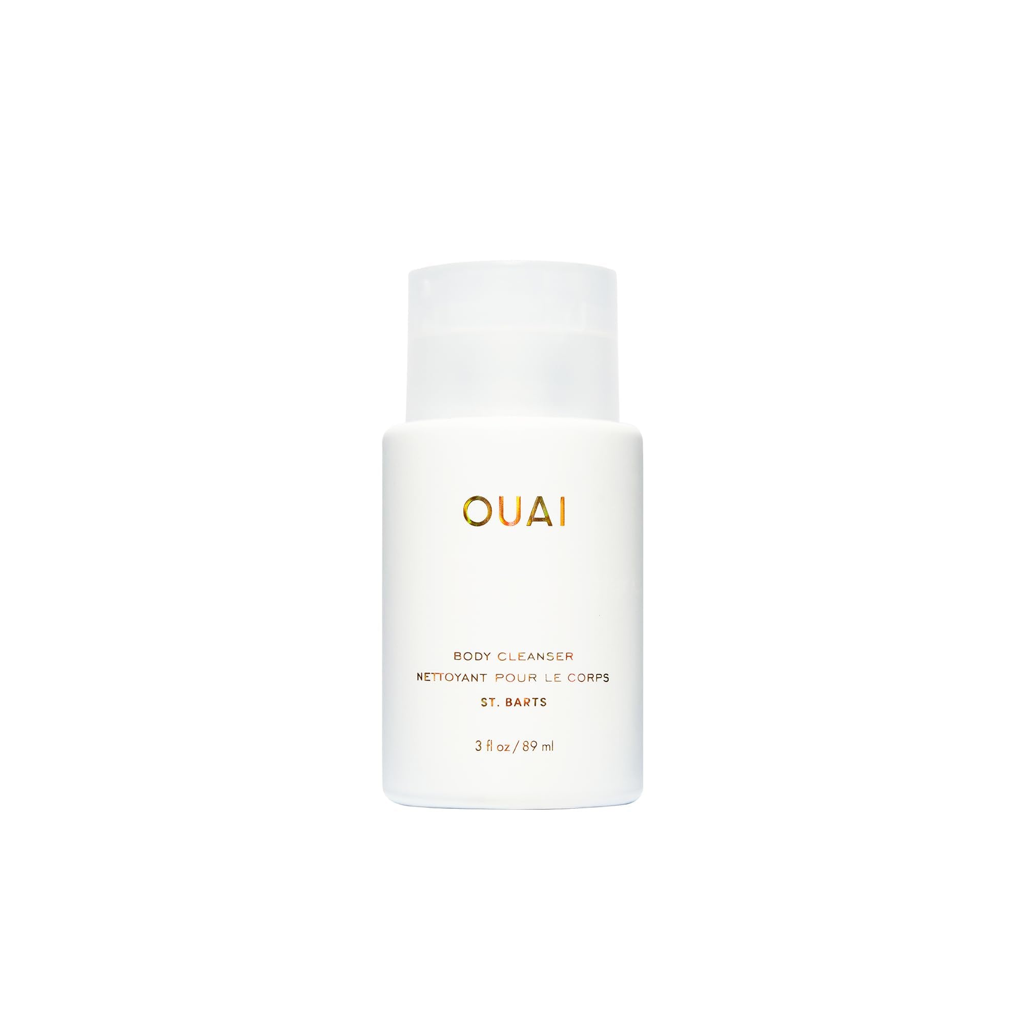 OUAI front bottle showing St. Barts travel packaging and clear brand identity