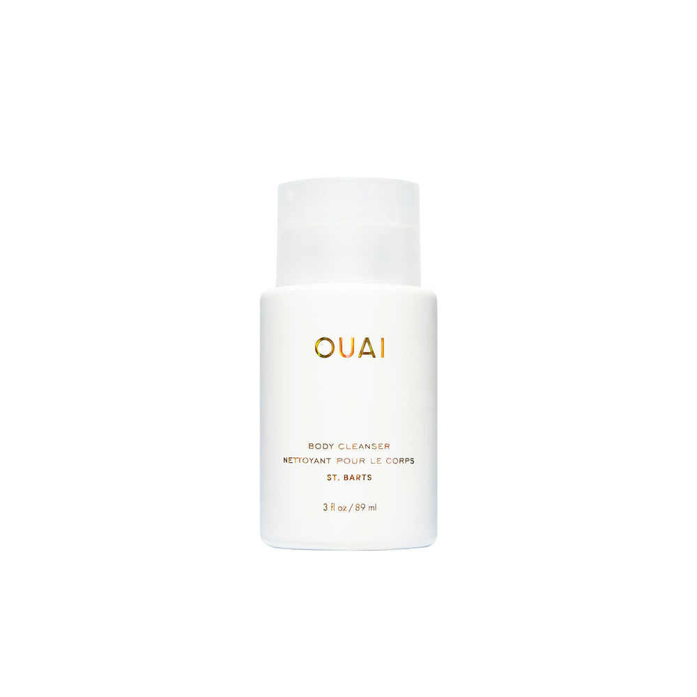 OUAI front bottle showing St. Barts travel packaging and clear brand identity