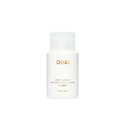 OUAI front bottle showing St. Barts travel packaging and clear brand identity