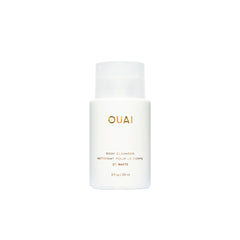 OUAI front bottle showing St. Barts travel packaging and clear brand identity