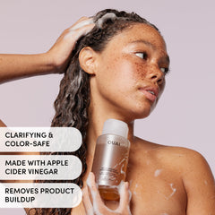 OUAI Medium Conditioner creamy texture showing easy application