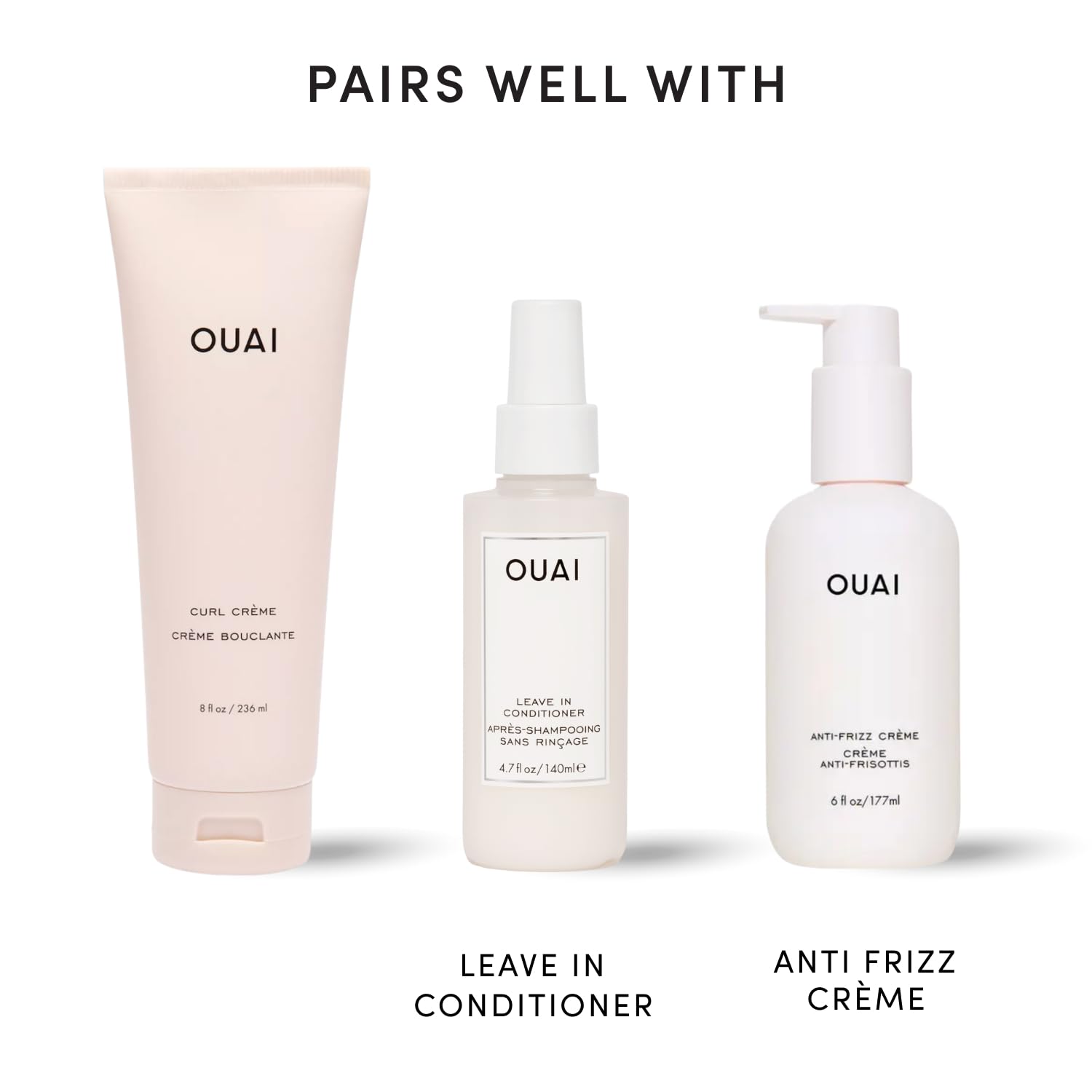 OUAI next to hand for size comparison showing the 8 oz product scale