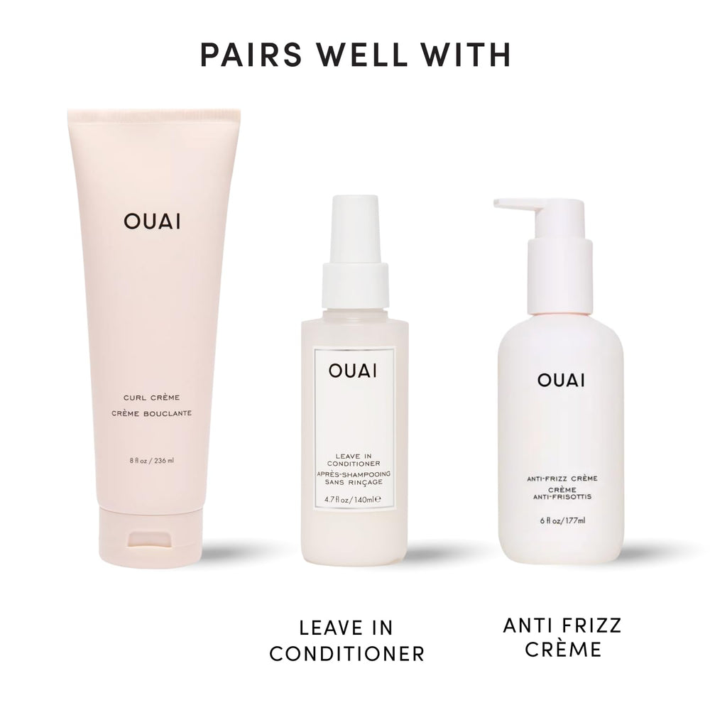 OUAI next to hand for size comparison showing the 8 oz product scale