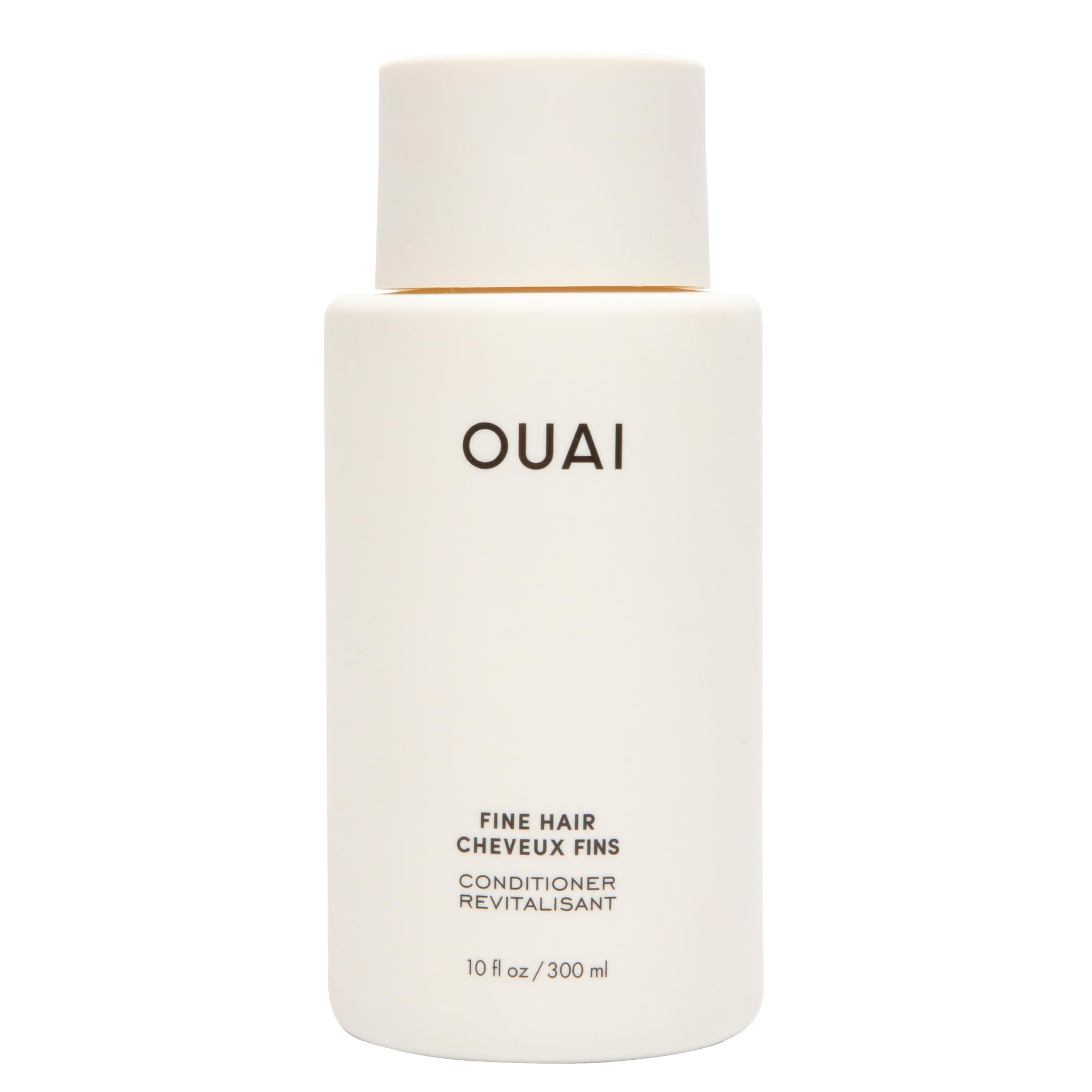 OUAI bottle front view showing branding and lightweight volumizing benefit