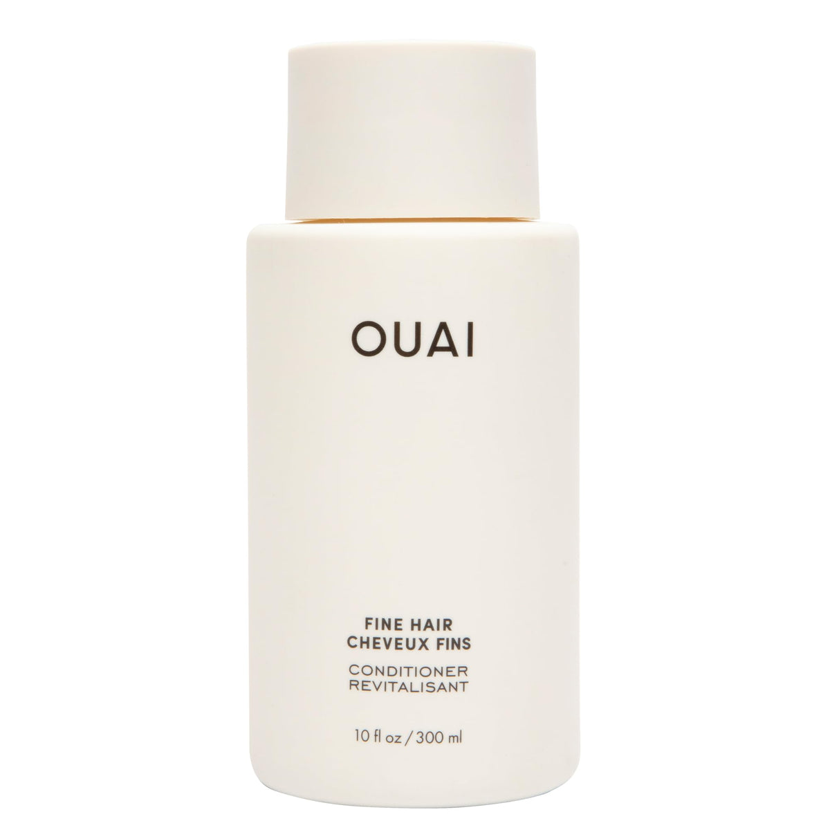 OUAI bottle front view showing branding and lightweight volumizing benefit