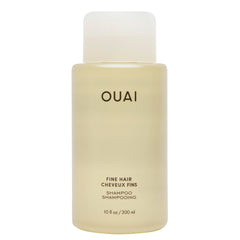 OUAI bottle front showing fine hair shampoo, clear volume benefit