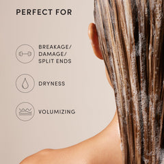 OUAI shampoo applied in shower, illustrating easy root-to-tip lift