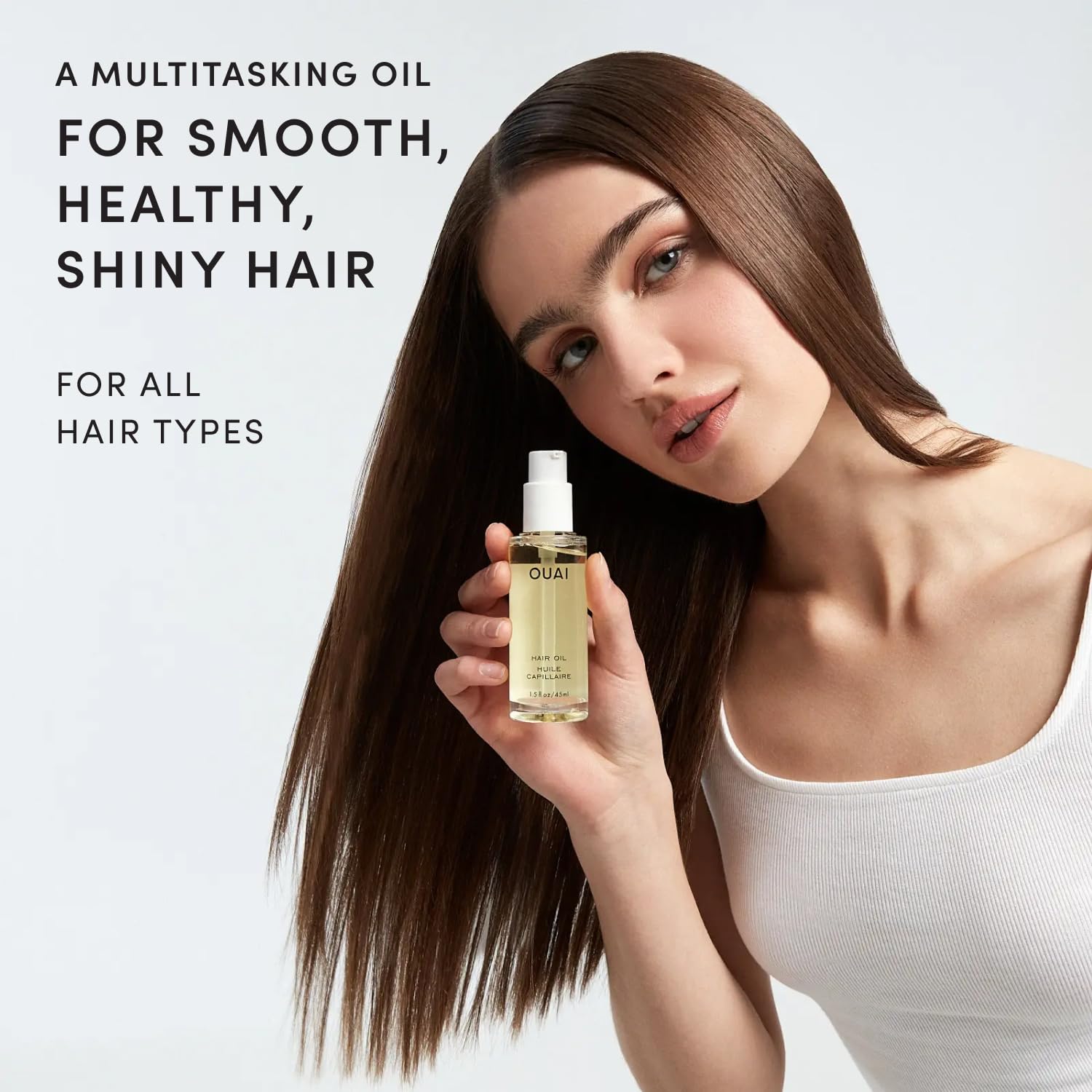OUAI hair oil back label lists ingredients and safety features