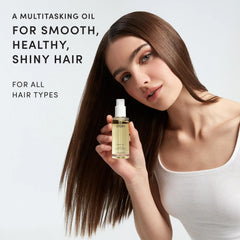 OUAI hair oil back label lists ingredients and safety features