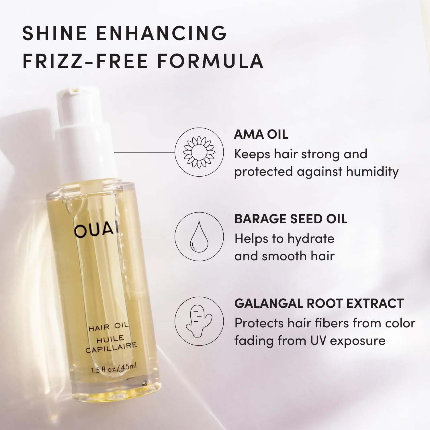 OUAI hair oil in hand showing travel-friendly 1.5 fl oz size