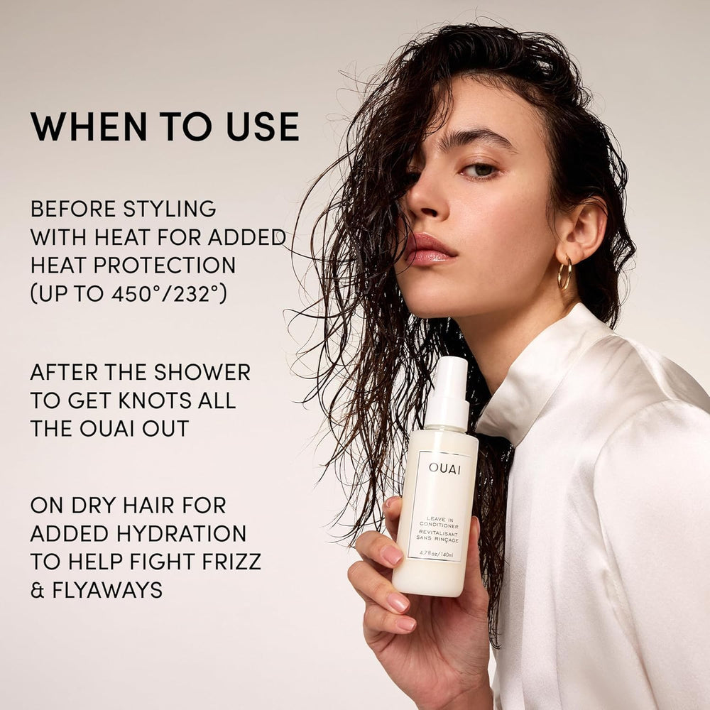OUAI leave in conditioner being combed through mid-lengths, showing reduced knots and smoother strands