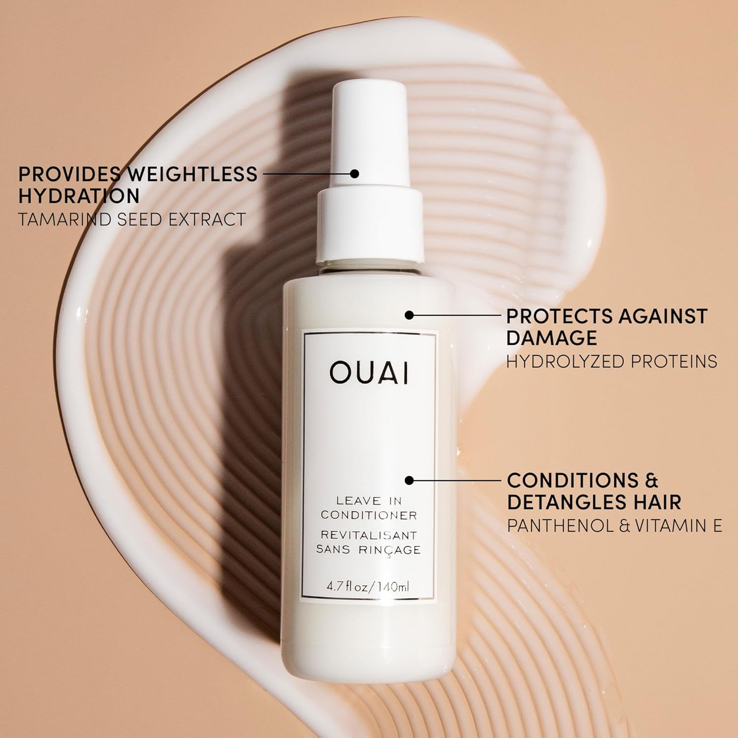 OUAI product label close-up with ingredient names visible, emphasizing amino acids and vitamin E