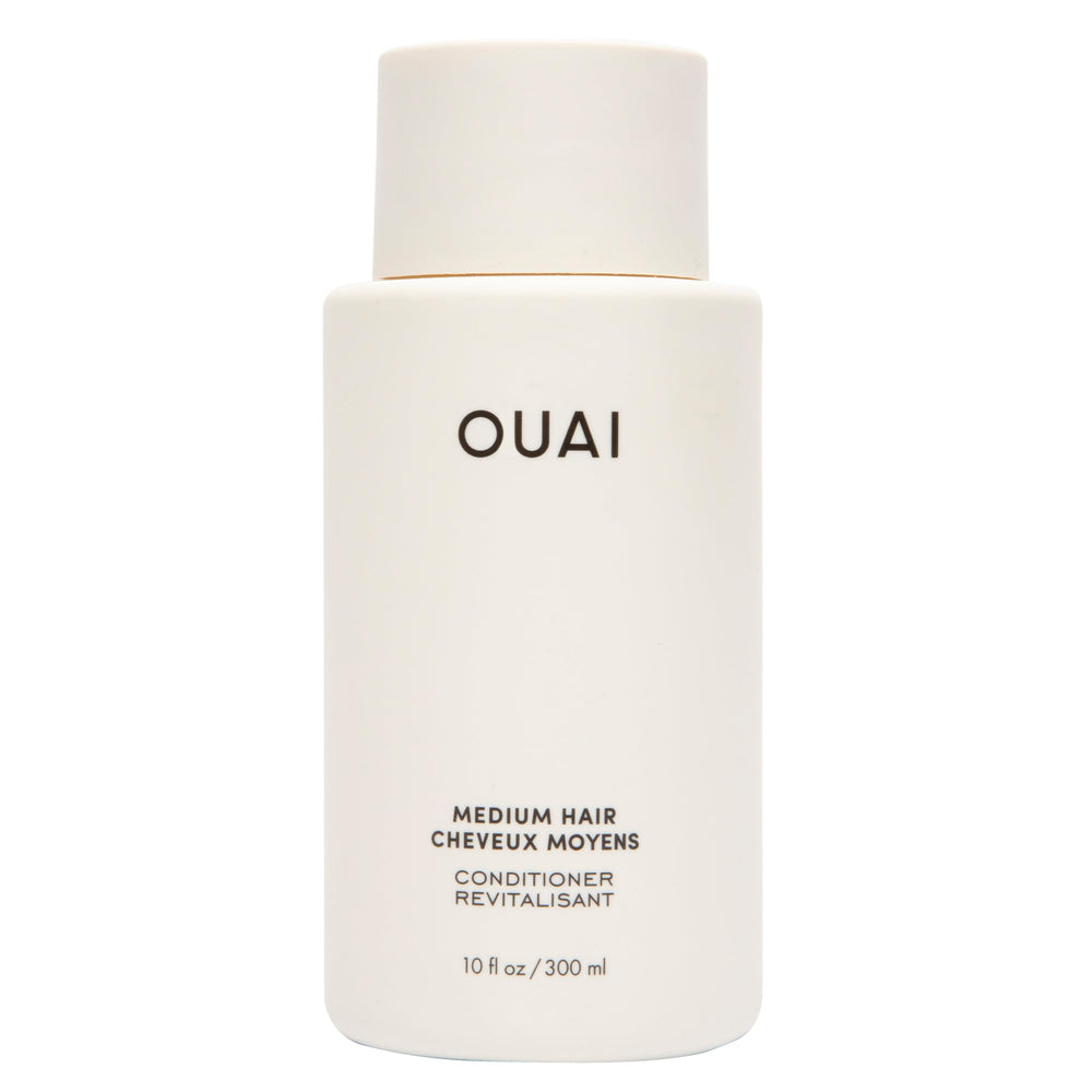 OUAI medium conditioner front bottle view showing clean design and size benefit