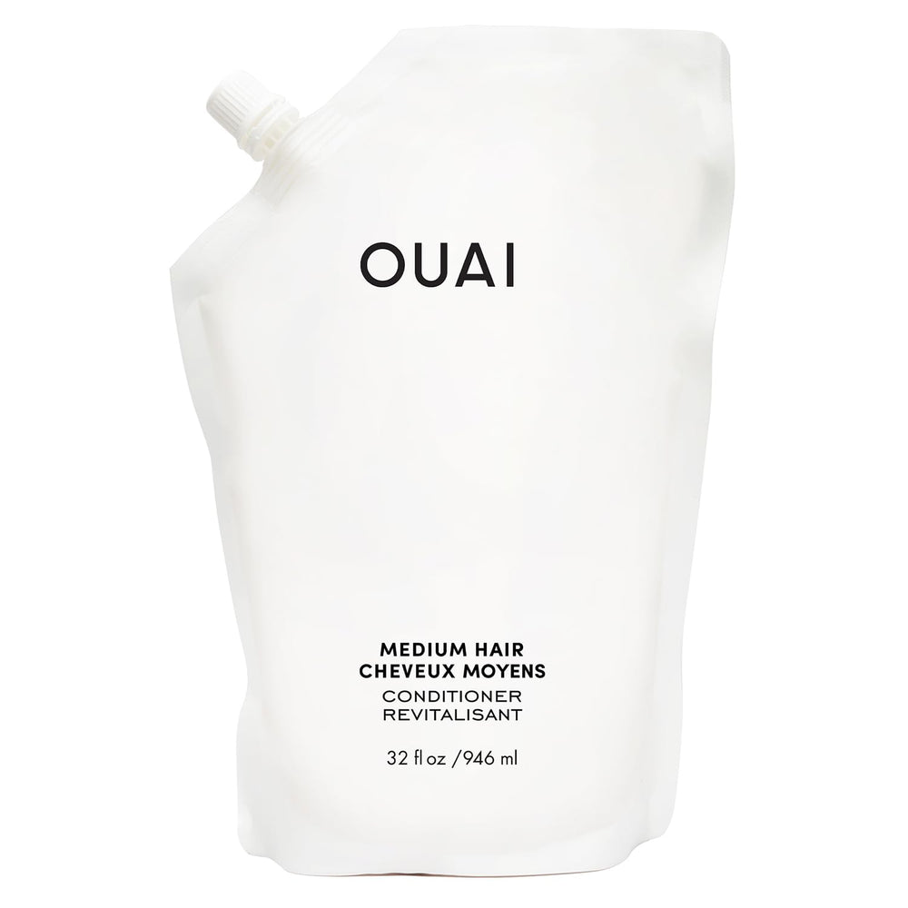 OUAI refill pouch front view showing product branding and size, promotes sustainability