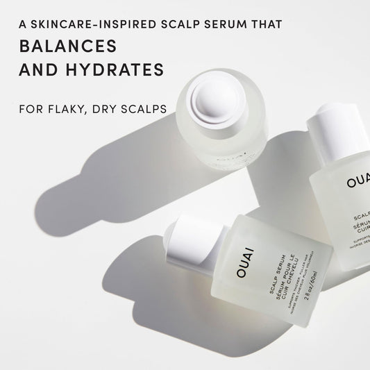 OUAI scalp serum dropper dispensing clear serum for precise application