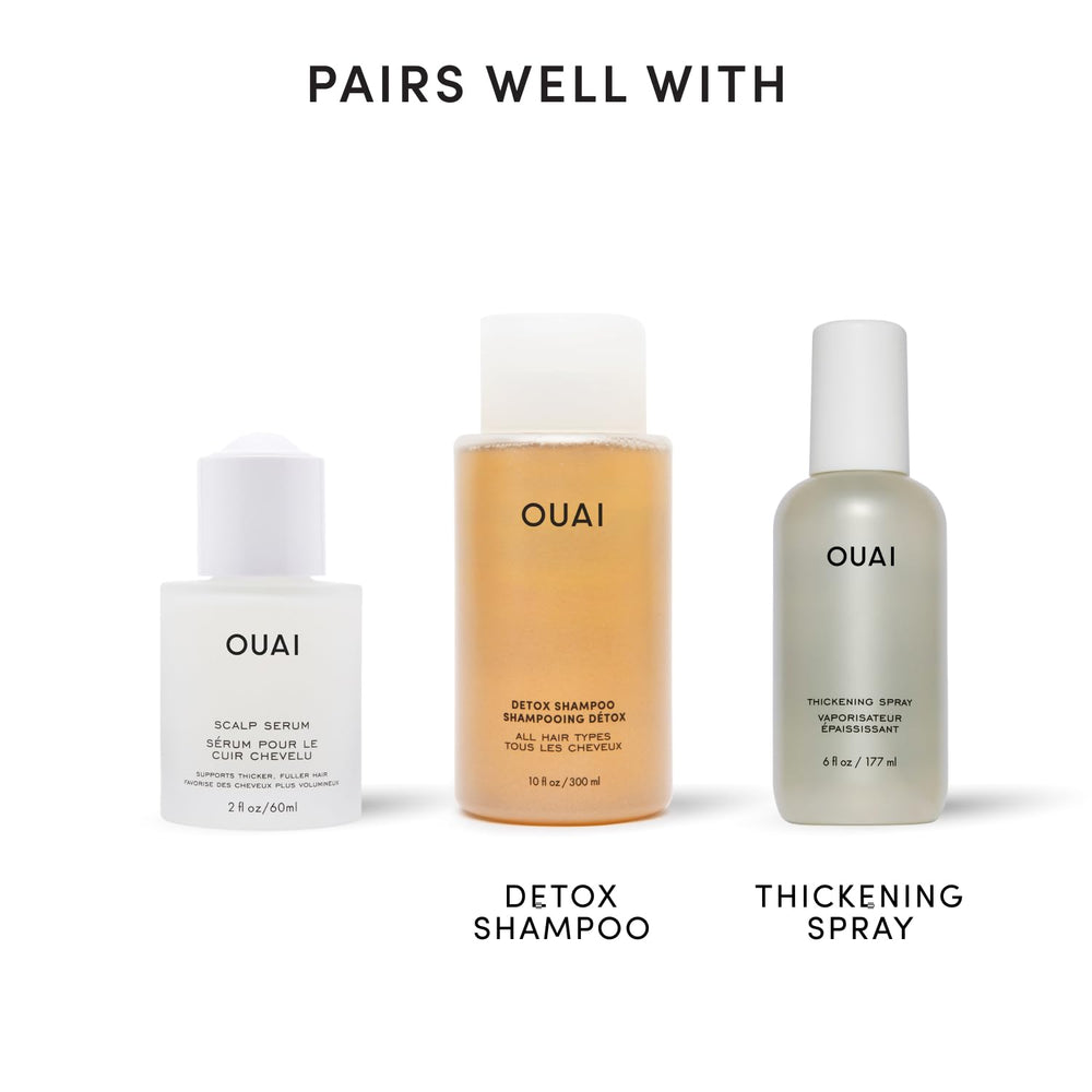 OUAI scalp serum on bathroom shelf in lifestyle scene suggesting daily routine