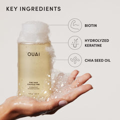 OUAI bottle with fragrance card showing Mercer Street scent notes