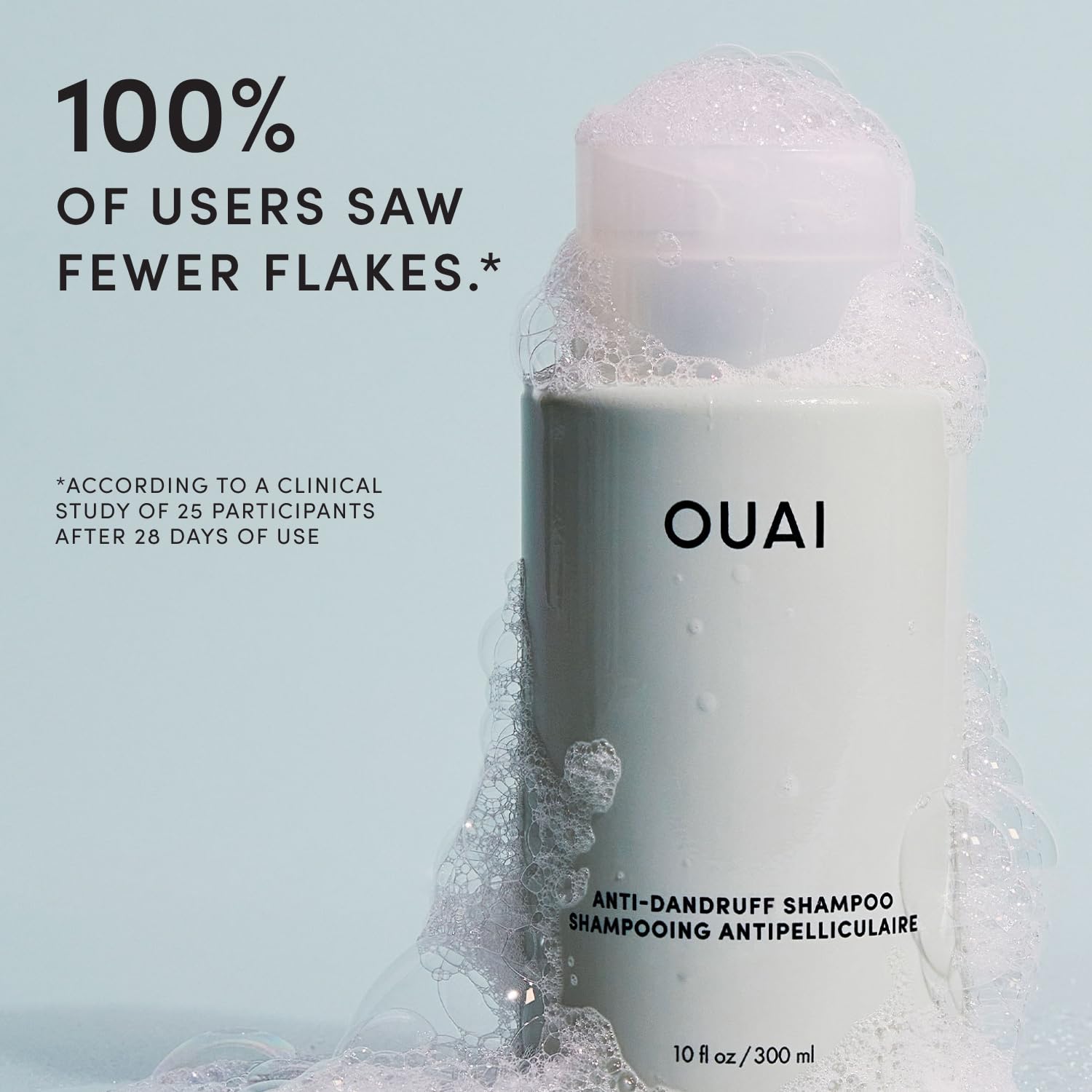 OUAI shampoo lathered in hand demonstrating gentle cleansing action