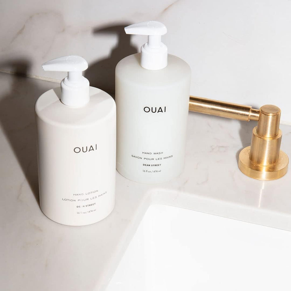 OUAI 16 fl oz bottle next to a common object showing true-to-size benefit