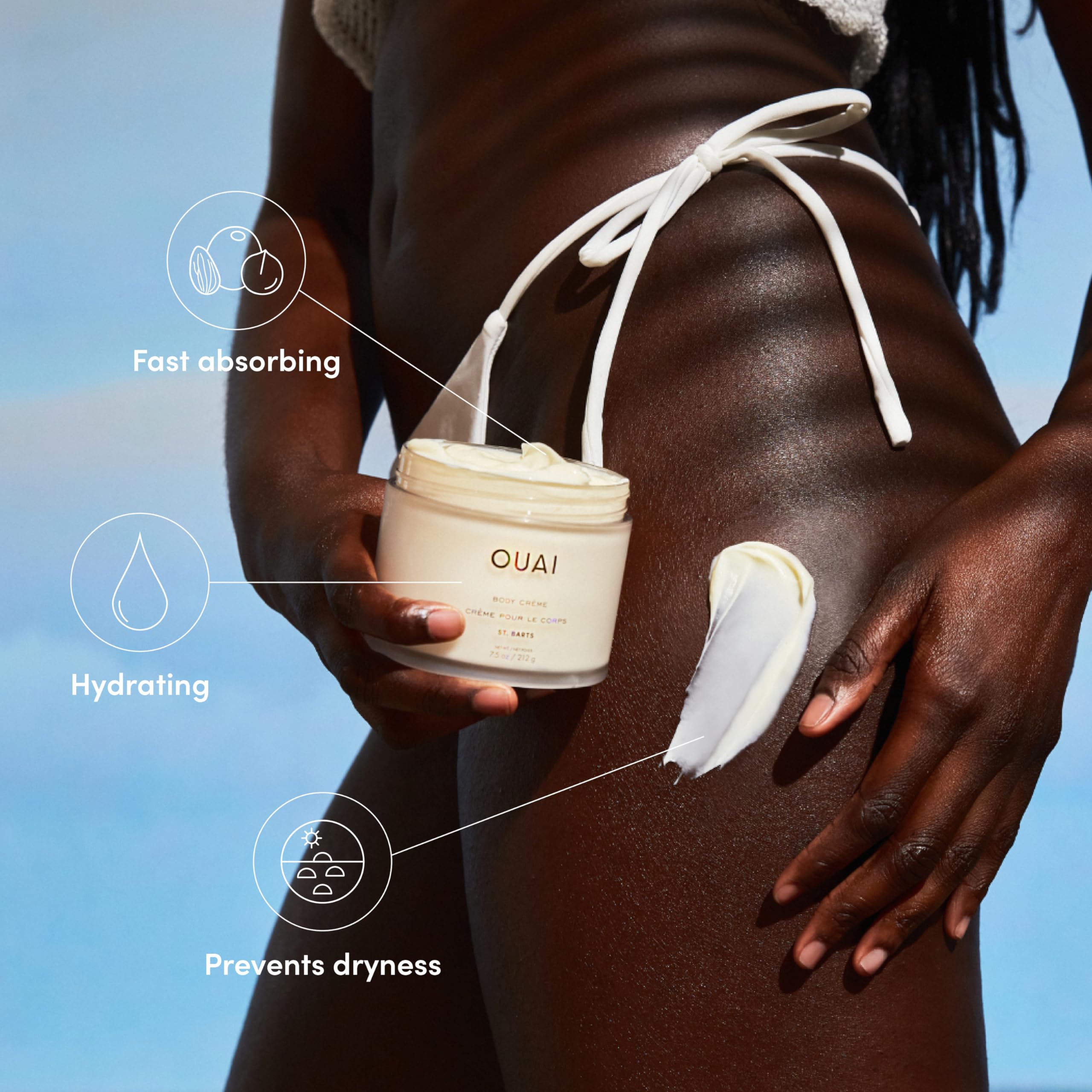 OUAI whipped body cream texture close-up showing creamy spreadable hydration benefit