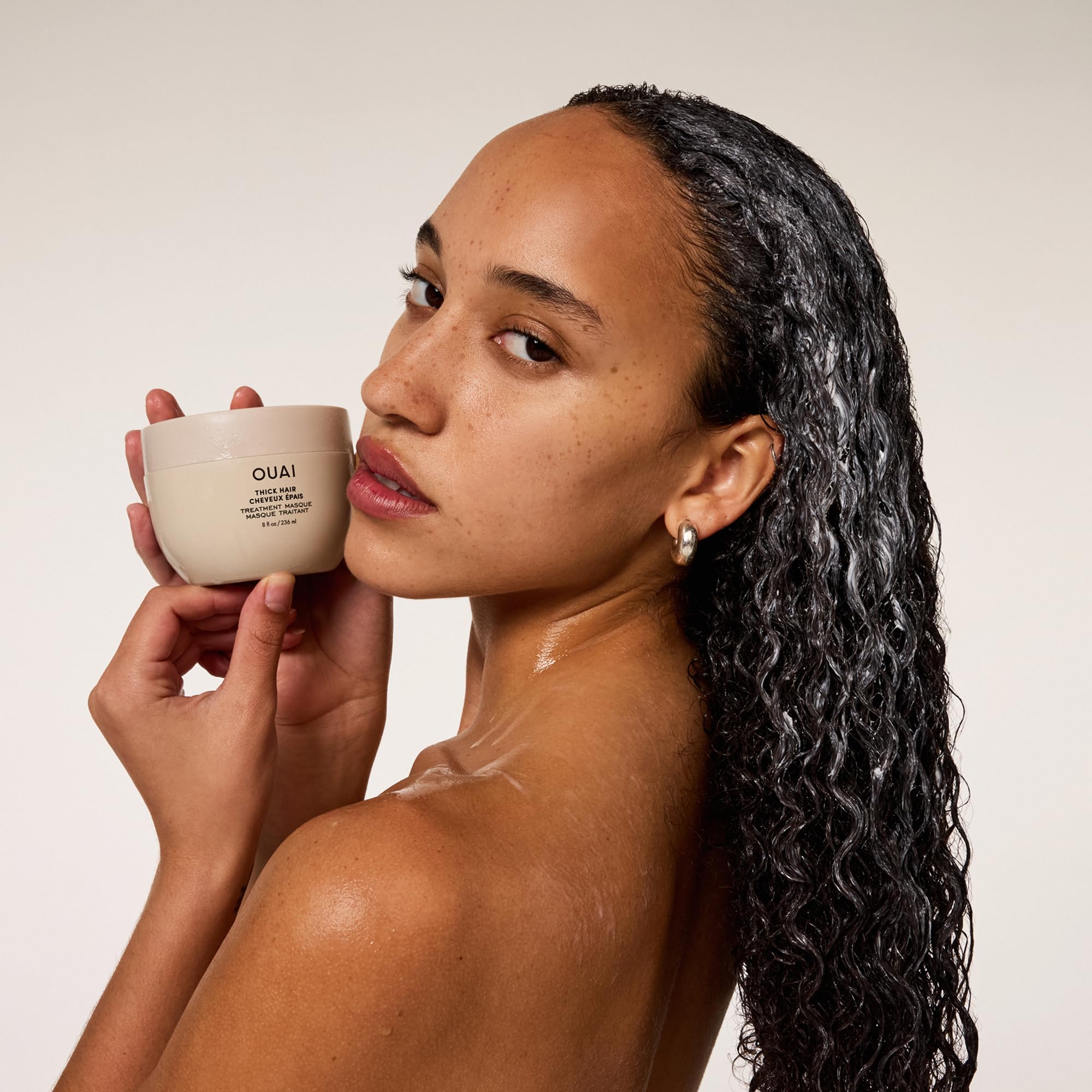 OUAI before and after hair showing smoother, stronger-looking strands