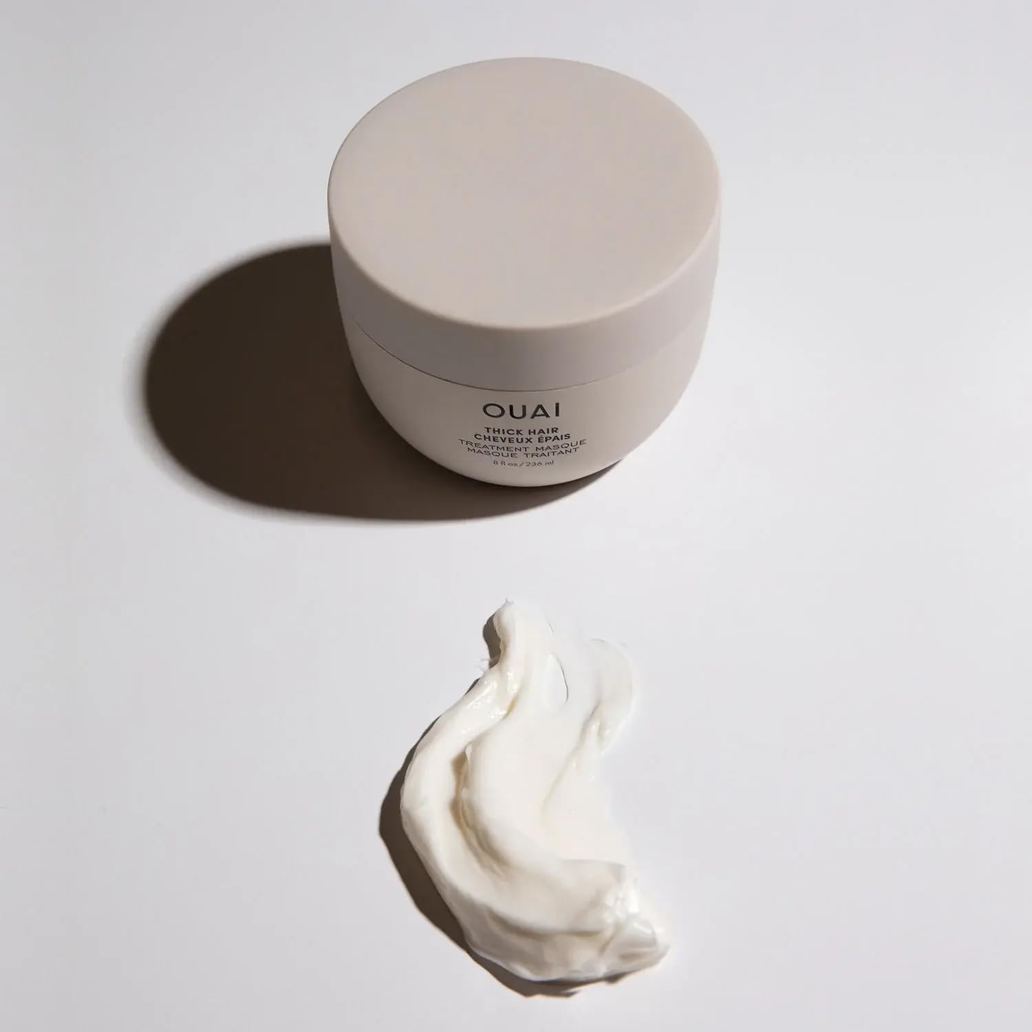 OUAI mask on bathroom shelf styled in a lifestyle scene for routine benefits