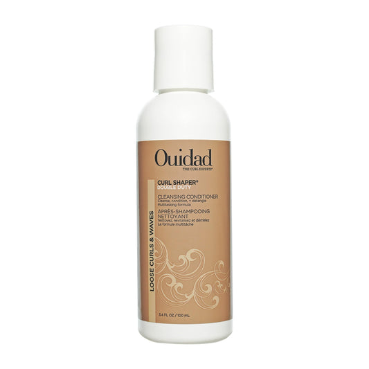 Ouidad travel bottle front view showing compact size and brand