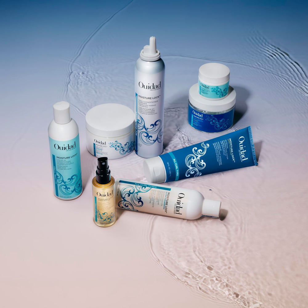 Ouidad used on curly hair in lifestyle scene, showcases restored soft bounce
