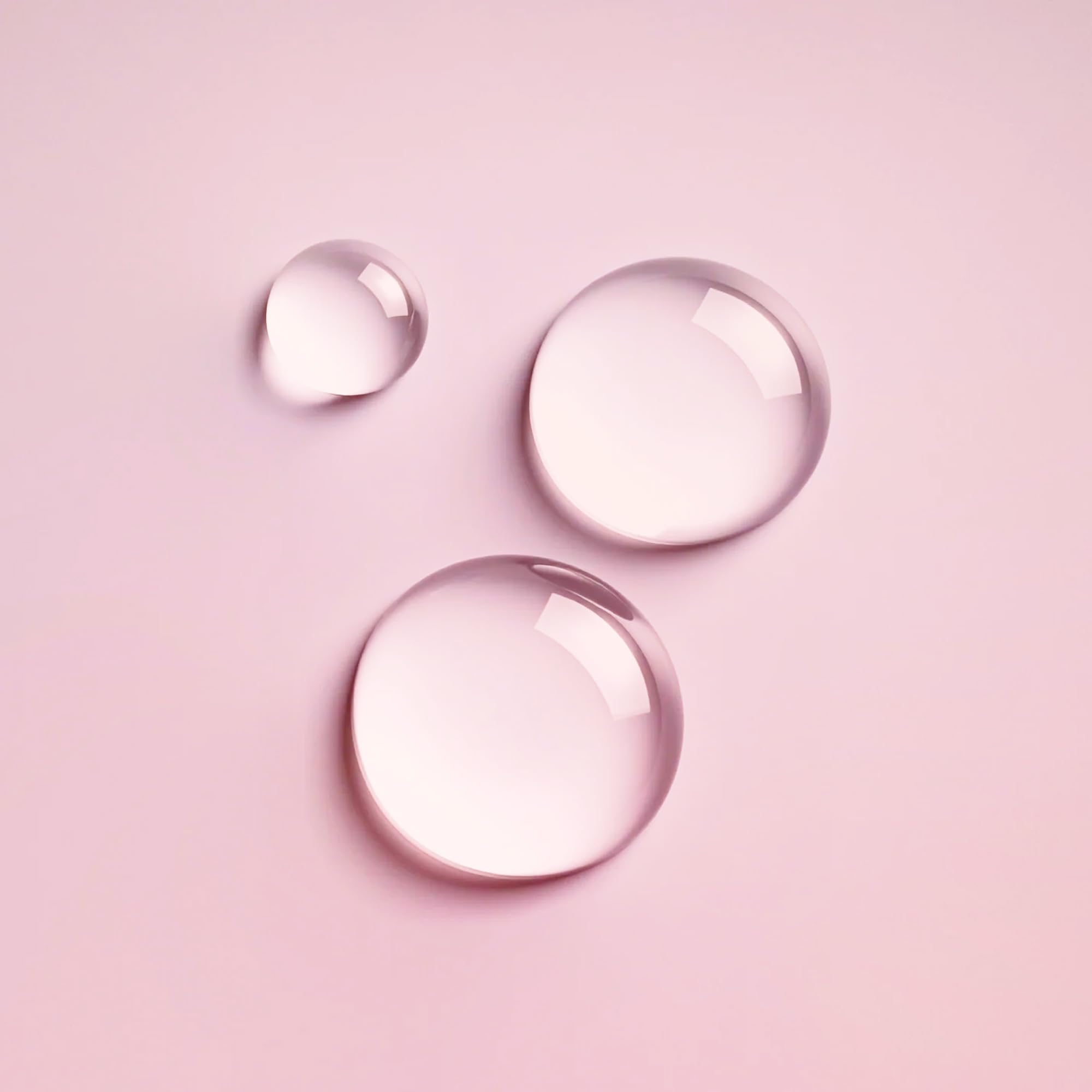 Drop of Mongongo and Meadowfoam seed oils highlighting Ouidad nourishing curl boost