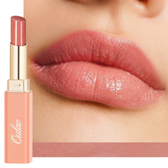Oulac tube front view showing pink peach shade and glossy finish benefit
