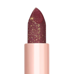 Oulac lifestyle evening look showing bold shimmer and long-wear appeal