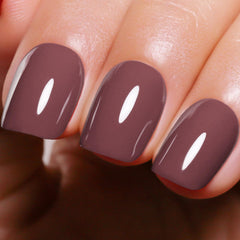 Ozzeal bottle front view showing coffee brown shade and sleek label benefit long-lasting color