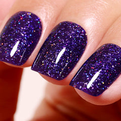 ozzeal front bottle displaying deep purple iridescent glitter and easy application benefit