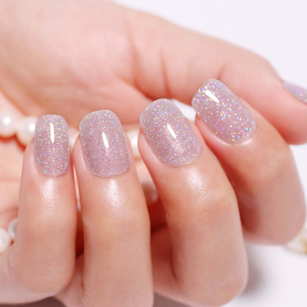 ozzeal in use under led lamp curing for quick hardening and salon results