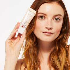 Pacifica applying BB cream from tube onto finger, demonstrates easy primer benefit